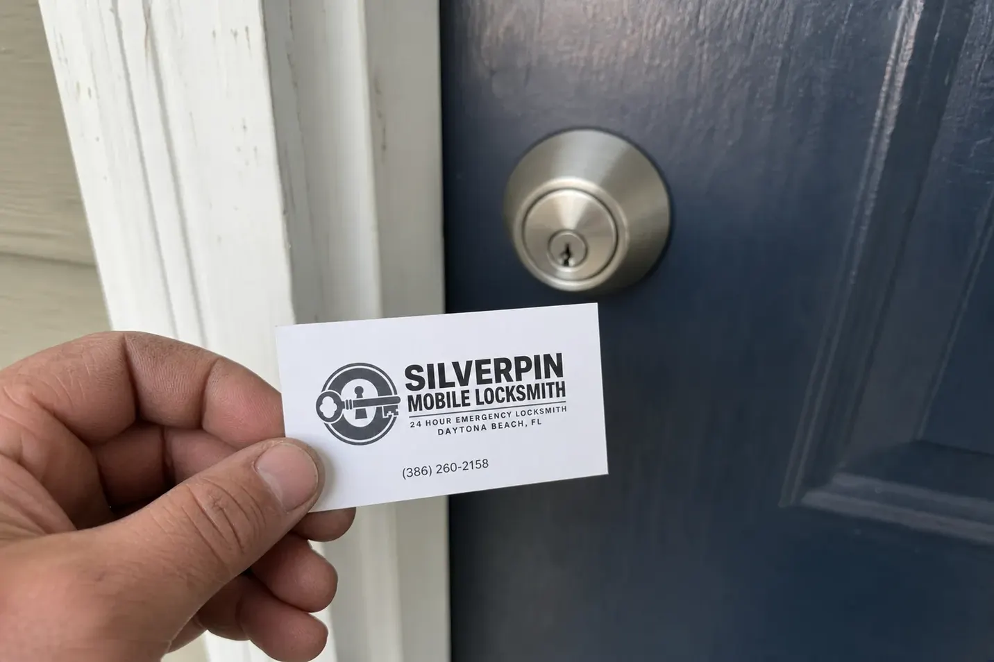 Silverpin Mobile Locksmith card at a job in Daytona Beach